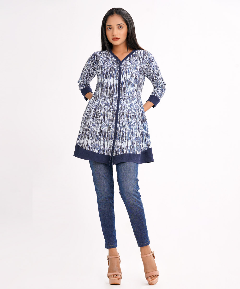 Blue all-over printed A-line Tunic in Georgette fabric.