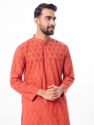 Brownish Red Fitted all-over printed Panjabi in Cotton fabric. Designed with a mandarin collar and hidden button placket. Embellished with embroidery on the chest.