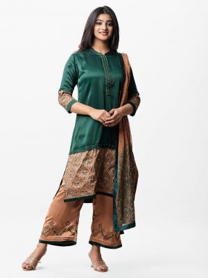Exclusive straight salwar kameez in silk & viscose blended fabric from Nargisus by Le Reve. Three quarter sleeved, mandarin collar, karchupi at front. Straight palazzo with chiffon silk dupatta.