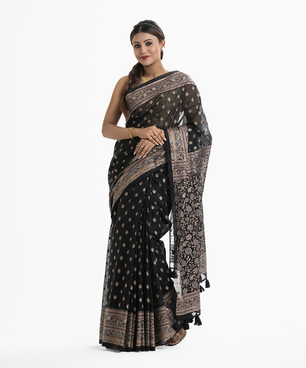 Women's all over printed saree in cotton fabric. Tassel attached at the achal. Women's all over printed saree in cotton fabric. Tassel attached at the achal.