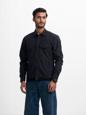 Four-pocket shacket in Black Blended Nylon fabric. Classic collar, full sleeves with adjustable buttons.